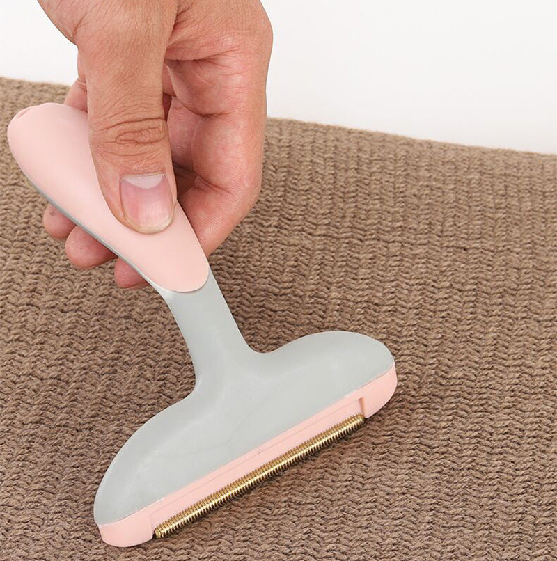 Portable sweater scraper